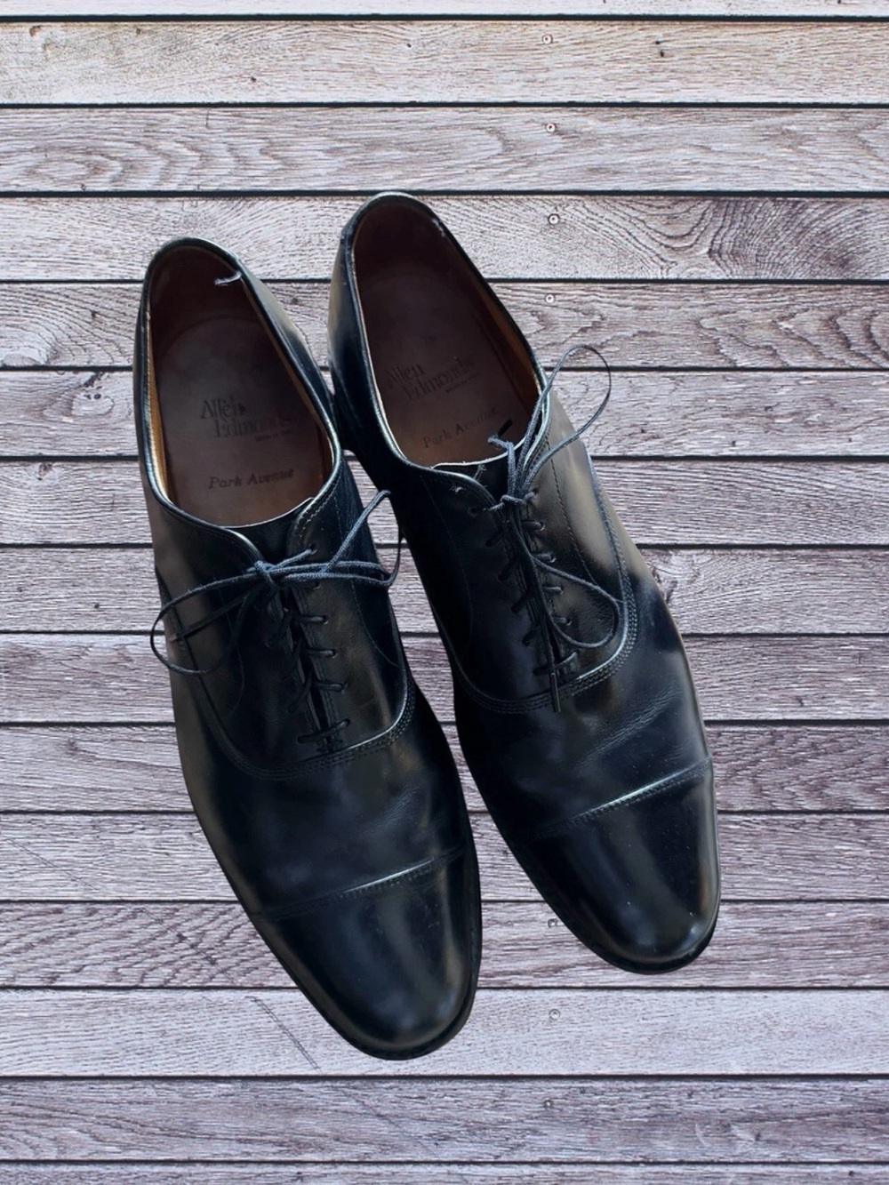Allen Edmonds Black Leather Cap-Toe Derbys
